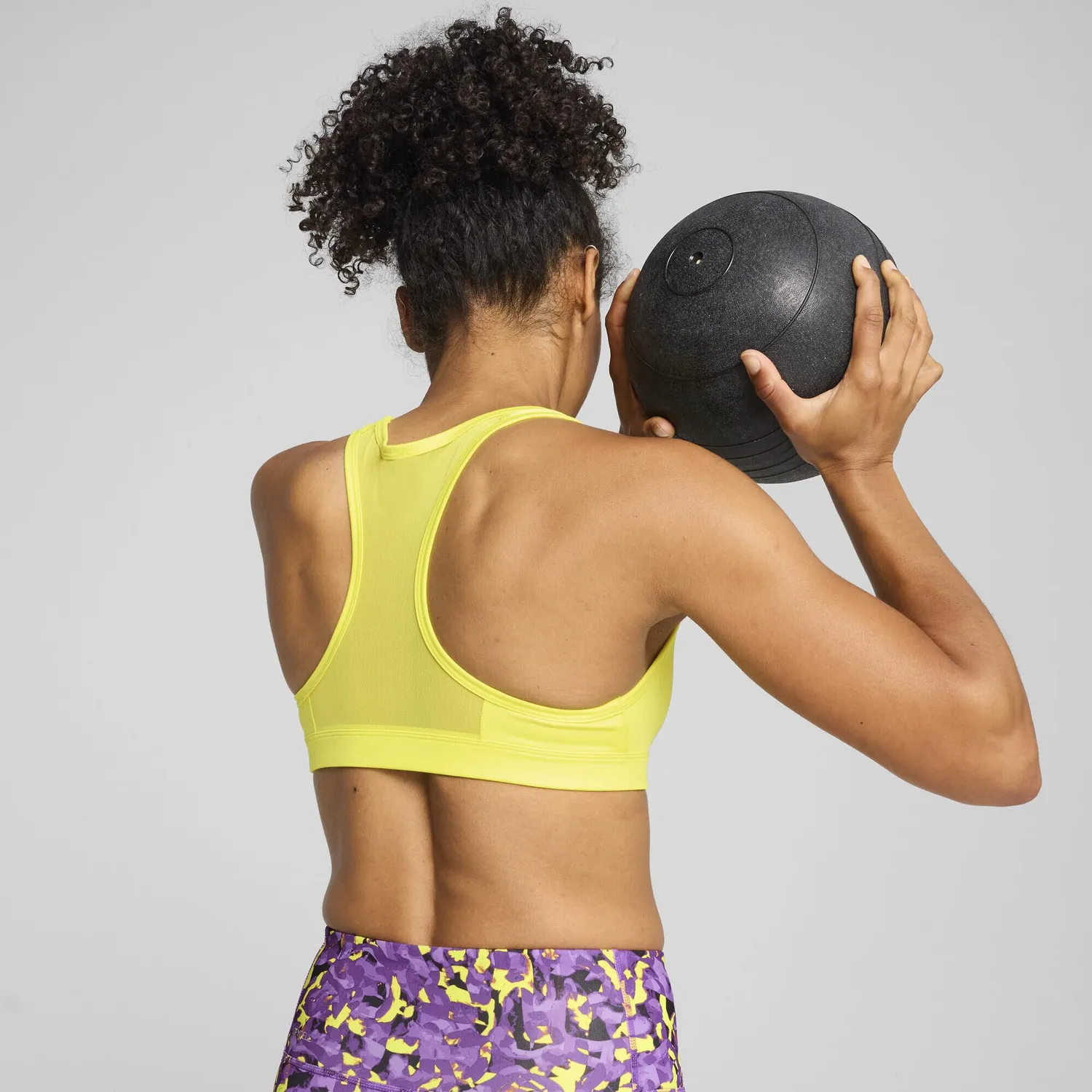 Puma 4Keeps Mid Impact reggiseno sportivo multicolore