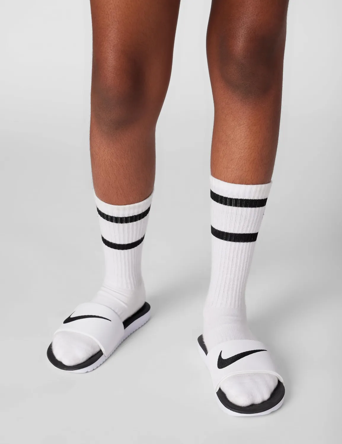 Nike Kawa ciabatte bambino nero bianco piscina