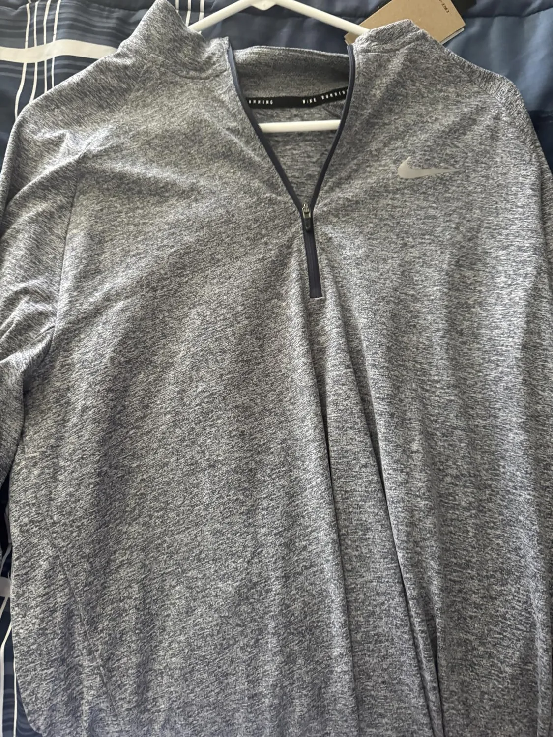 Nike Stride Dri-Fit maglia running uomo nera mezza zip